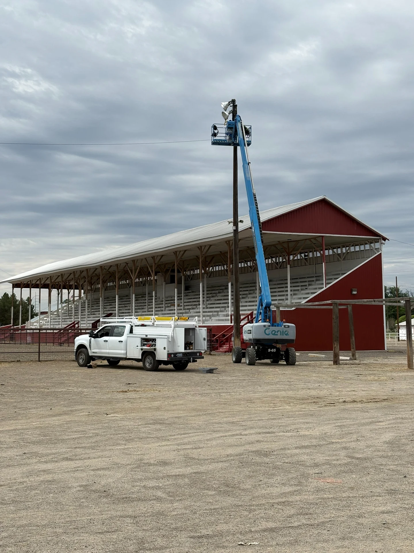 Commercial arena lighting maintenance boom lift and service truck in Ontario, OR by Campbell Electric