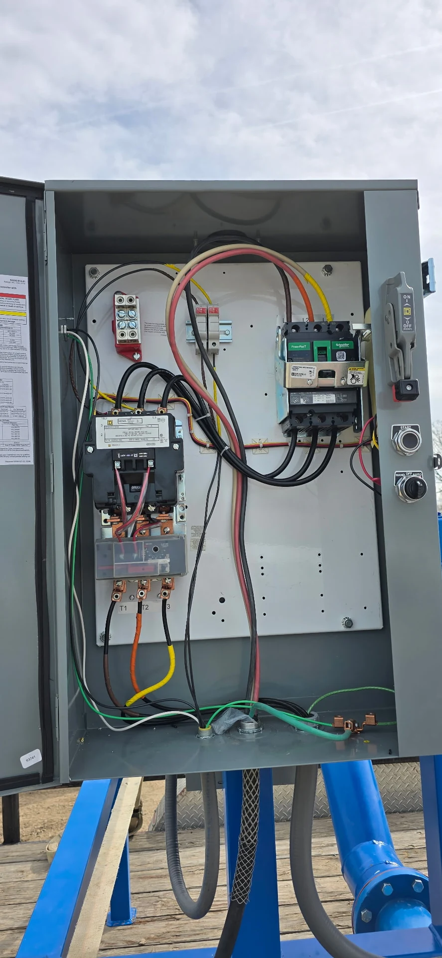 Outdoor agricultural motor control panel wiring and circuit breaker installation in Ontario, OR by Campbell Electric